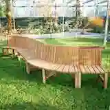 A Curved Wooden Bench by Woodcraft UK