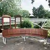 A Steel Curved Garden Bench by Woodcraft UK