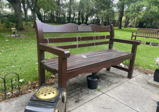 Side view of a 16 year old Beverley Bench with dark varnish