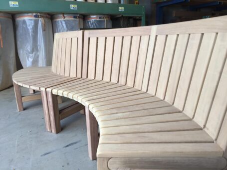 Curved bench with side table ends