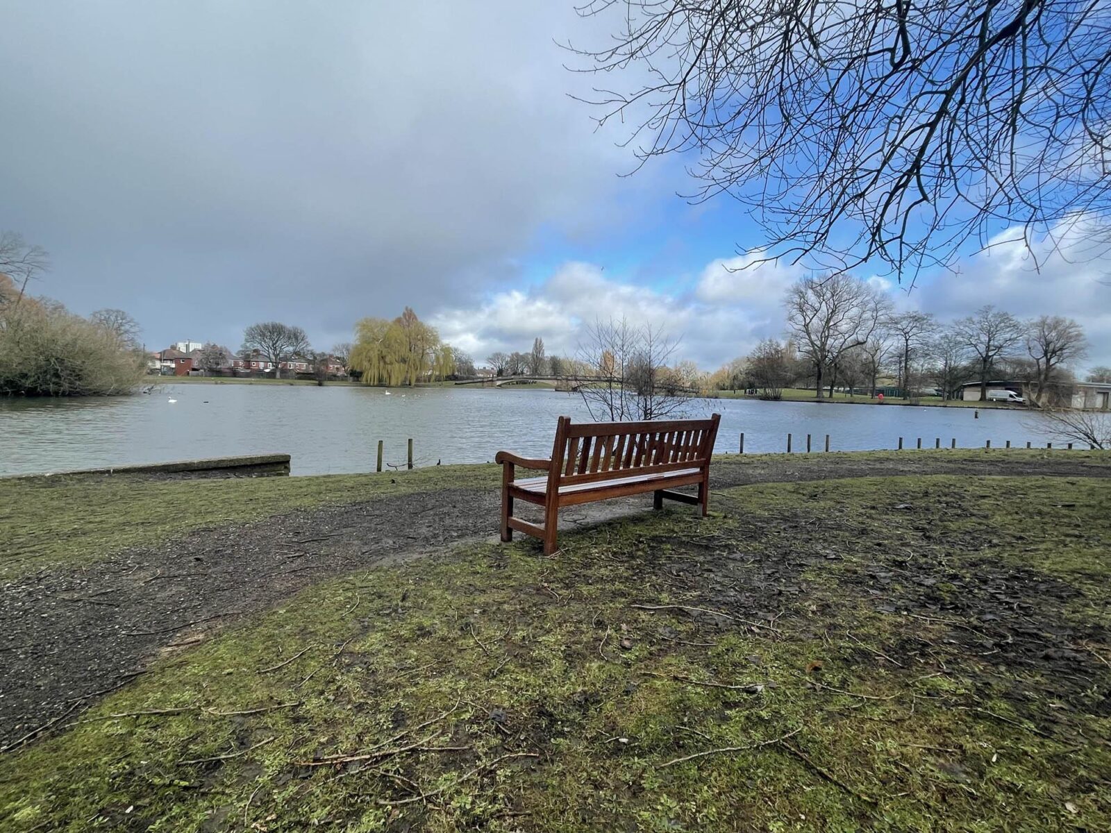 Our wooden park bench by the lake
