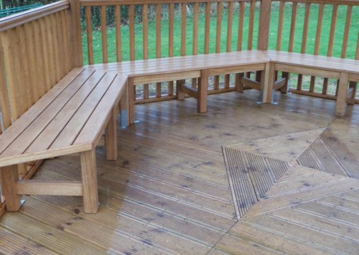 Wooden seating inside the play shelter