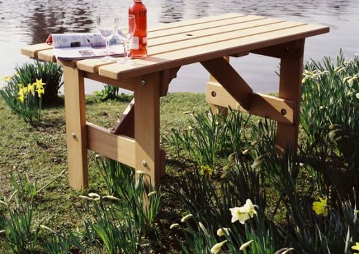 Adapted garden table for wheelchairs by lake