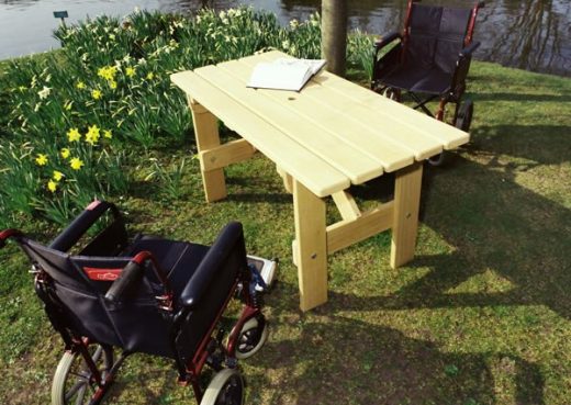 Adapted garden table for wheelchairs