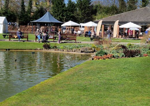 Visitors relaxing on a sunny day on our benches at Burnby Hall