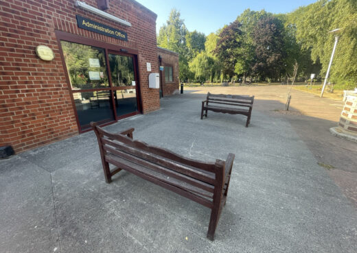 Two long-standing Woodcraft wooden benches outside the Administration Office at Chanterlands Crematorium in Hull.