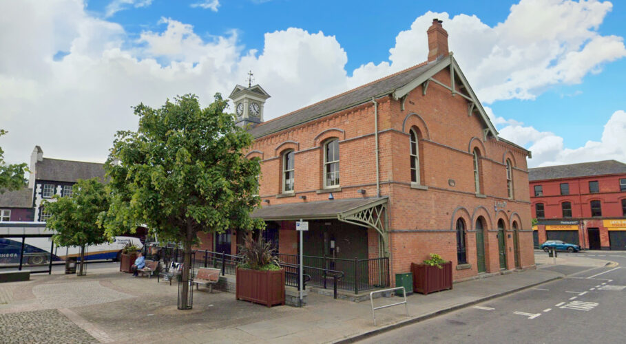 Side view of Dromore Town Hall with timber planter and seating area