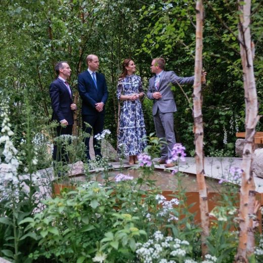 Alistair Bayford showing the Duke and Duchess Of Cambridge around the garden