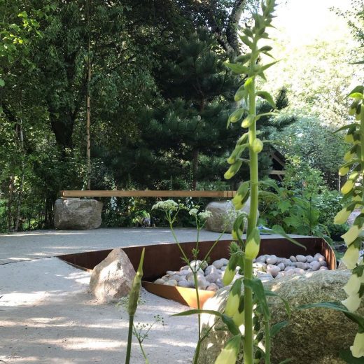 Shrubbery masking the Family Monsters bench at the RHS Chelsea Flower Show