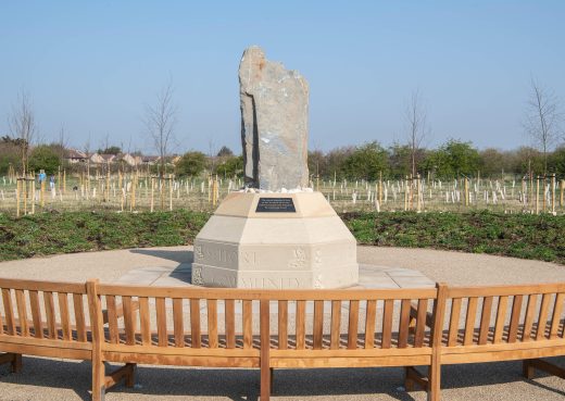 Curved bench in memorial are at Havering Borough Council