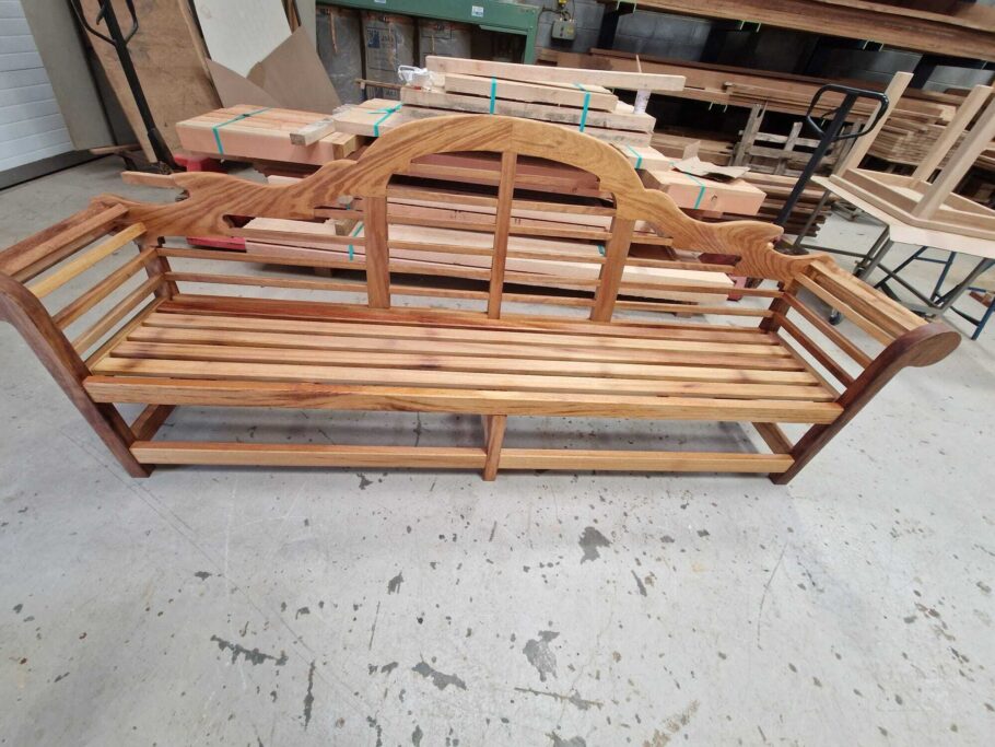 Handcrafted Lutyens-style hardwood bench finished in teak oil, completed for The Hurlingham Club, London.