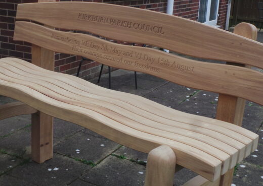 The VE / VJ Commemorative Waveform Bench for Kirkburn Parish Council