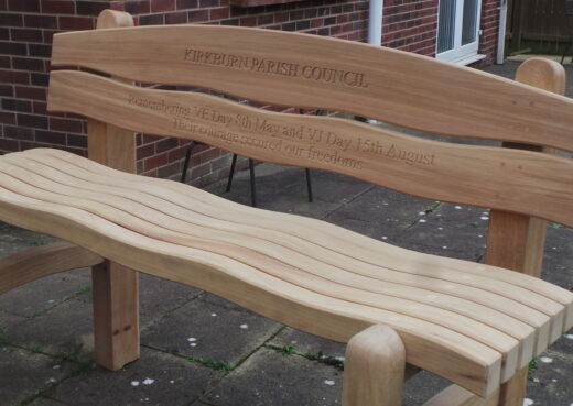 The VE / VJ Commemorative Waveform Bench with inscription