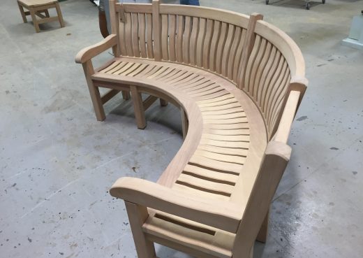 Curved bespoke memorial bench destined for London