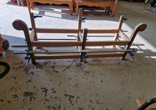 The frame taking shape of the Low Back Lutyens Bench in Construction.