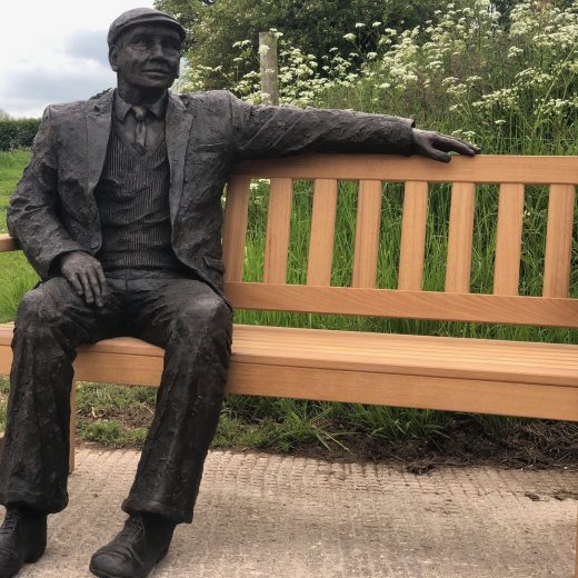 Arthur the bronze sculpture on our garden bench