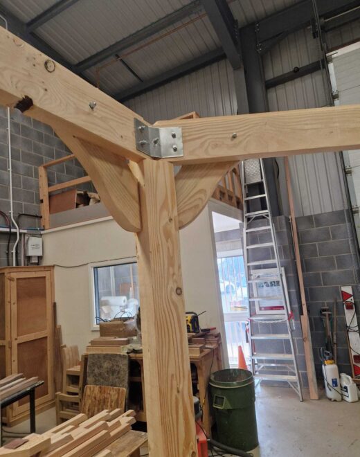 Metal fixing connecting the roof structure of the bespoke timber pergola