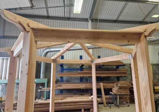 Roof rafters and turned timber finial on the bespoke wooden pergola