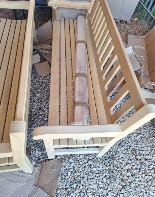 Hardwood York memorial bench delivered to Commonwealth War Graves Commission site in Crete, positioned outdoors prior to installation