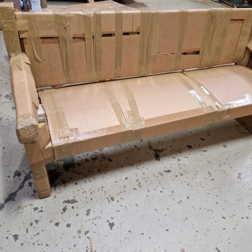 Protective packaging around handcrafted York bench during shipment from UK to Greece war cemetery