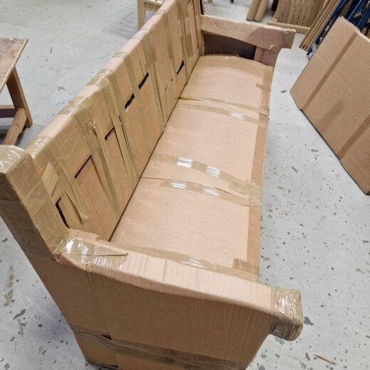 York wooden bench securely wrapped and ready for overland transport to Souda Bay War Cemetery