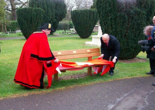 Folding away the flag on the titanic bench