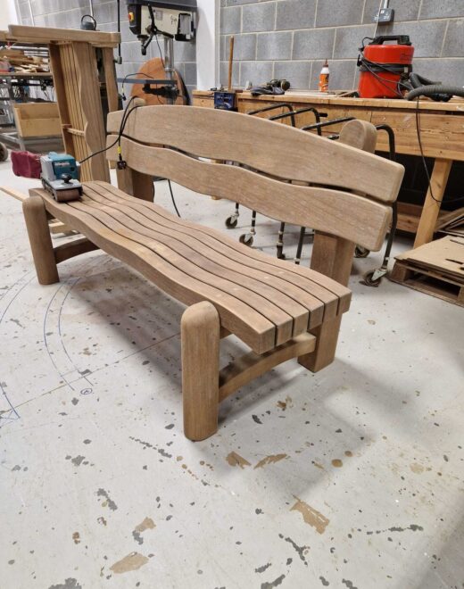 Solid hardwood outdoor bench with rounded legs
