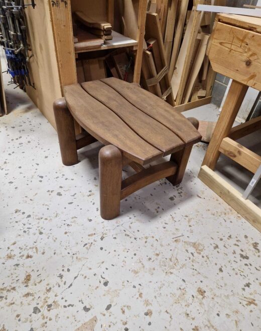 Chunky leg detail of hardwood garden coffee table