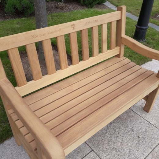 A York wooden bench in the grounds of the Royal Hospital Chelsea