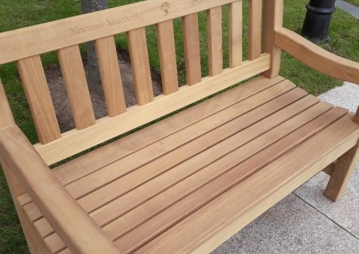 A York wooden bench in the grounds of the Royal Hospital Chelsea