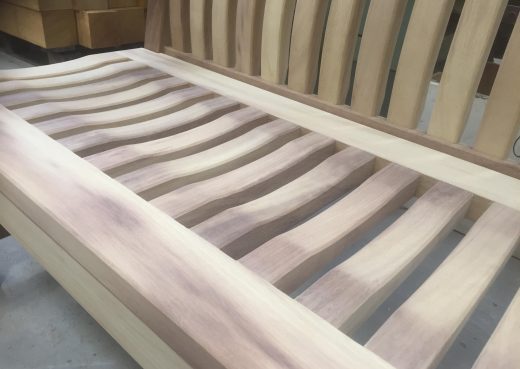 A Scarborough bench with a natural finish