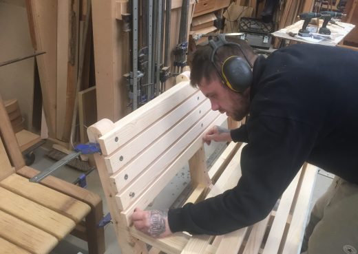 Luke assembling a bespoke wooden bench