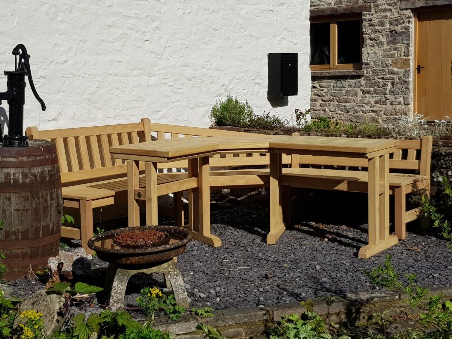 Bespoke corner angled wooden garden bench and table