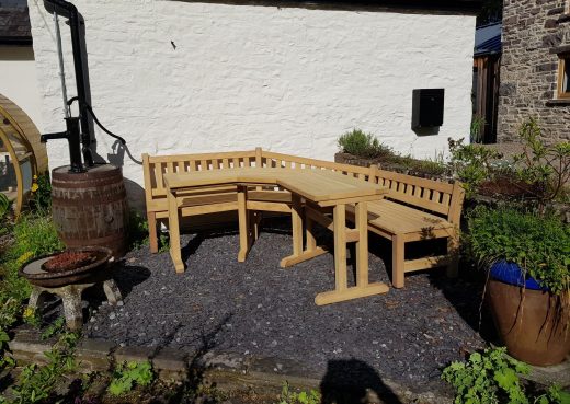 Garden bench and table in the patio area