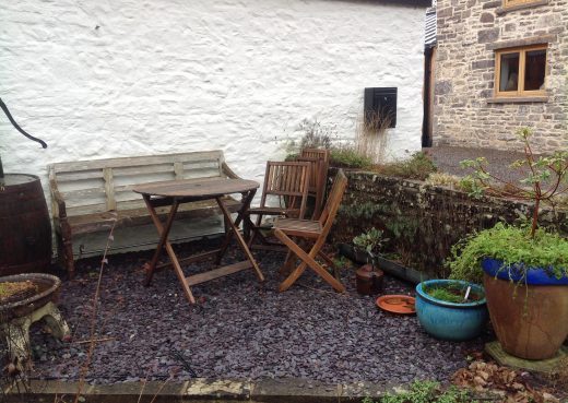 The old garden bench and deckchairs