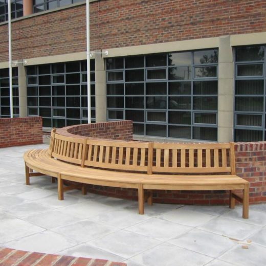 Curved street bench side view