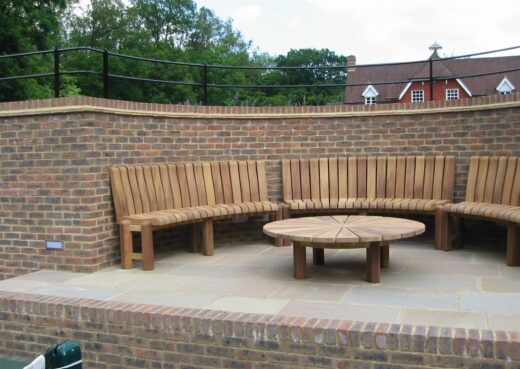 Outdoor curved bench and rounded table