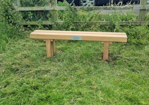 The Wykeham bench with memorial plaque