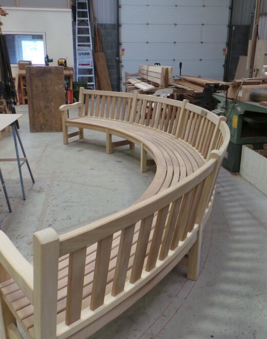 The large curved bench for Bushy Park