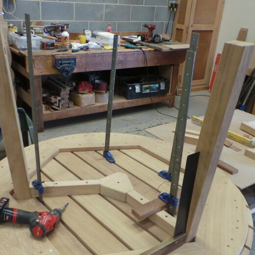 Positioning the part assembled frame on the table surface