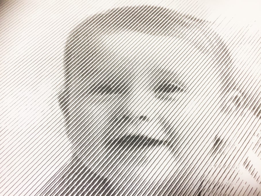 Detail of a portrait solely cut out by or CNC machine