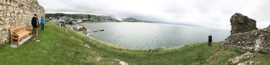 Panarama of the Woodcraft wooden bench at Criccieth Castle, showing Tremadog Bay