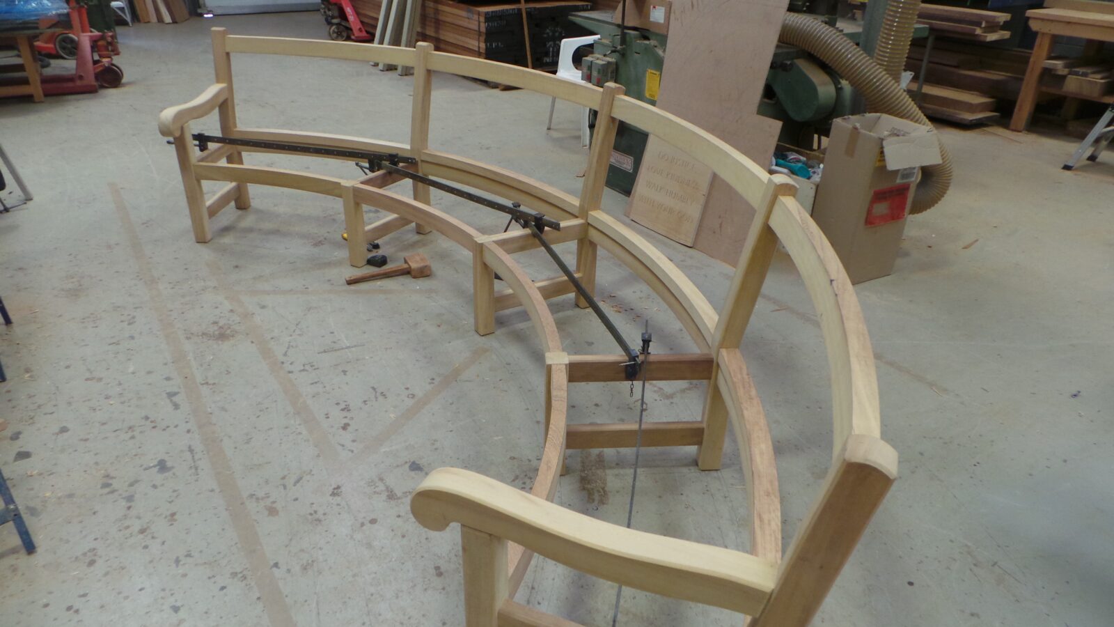 An international order of a Mendip style curved wooden bench which will ...