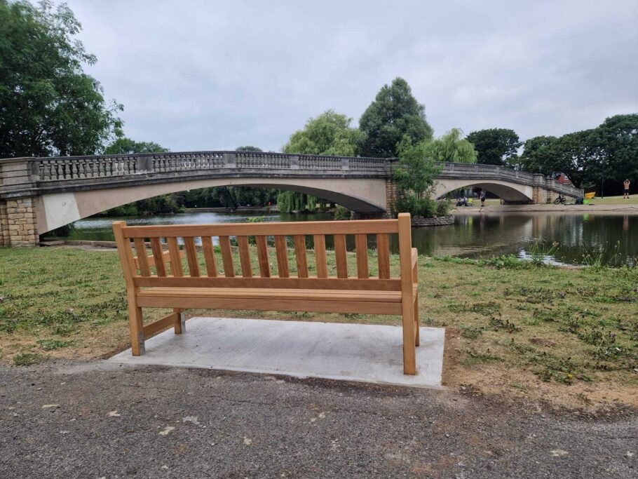 Rear view of York memorial bench overlooking East Park bridge and lake