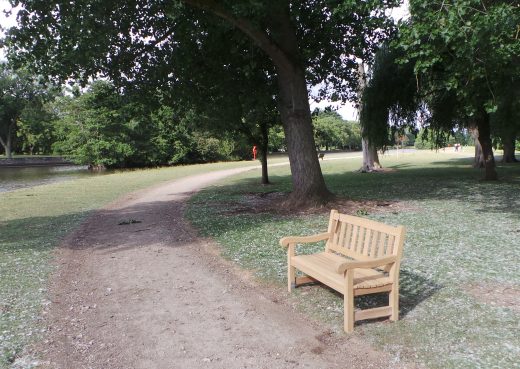 Our wooden park bench by the lake