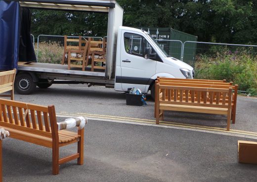 Wooden benches a packed with protective wrapping to prevent scuffs during the journey