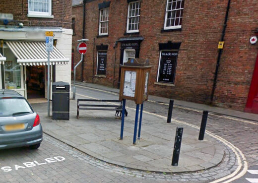 Three-sided handcrafted notice board designed for visibility from multiple directions in Hedon town centre.