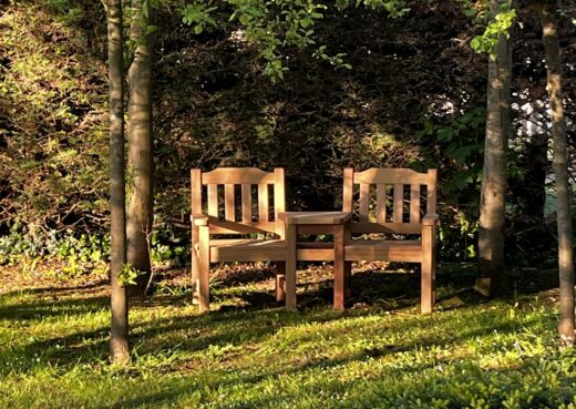 Close up of the Helmsley Companion Bench in Charles's orchard