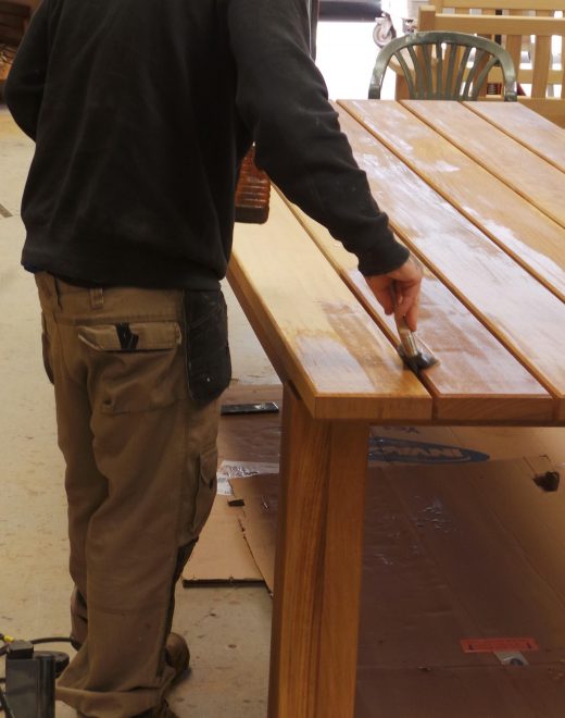 Dining table having Alfresco protector applied