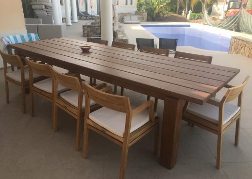 Our outdoor dining table by the swimming pool